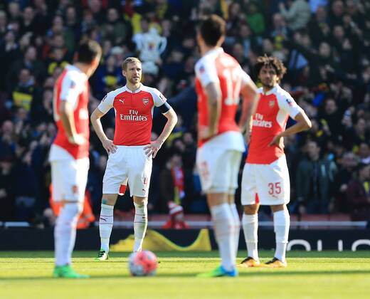 Arsenal s Per Mertesacker looks on dejected after going 2-0 down during the Emirates FA Cup match at The Emirates Stadium. Photo credit should read: David Klein Sportimage EDITORIAL USE ONLY. No use with unauthorised audio, video, data, fixture lists, club league logos or live services. Online in-match use limited to 120 images, no video emulation. No use in betting, games or single club league player publications.