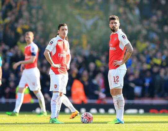 Arsenal?s Mesut Ozil and Olivier Giroud look on dejected after going 1-0 down during the Emirates FA Cup match at The Emirates Stadium. Photo credit should read: David Klein Sportimage EDITORIAL USE ONLY. No use with unauthorised audio, video, data, fixture lists, club league logos or live services. Online in-match use limited to 120 images, no video emulation. No use in betting, games or single club league player publications.