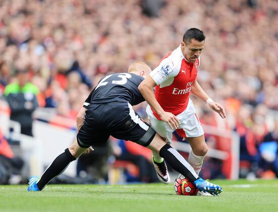 Arsenal s Alexis Sanchez tussles with Watford s Ben Watson during the Premier League match at Emirates Stadium. Photo credit should read: David Klein Sportimage EDITORIAL USE ONLY. No use with unauthorised audio, video, data, fixture lists, club league logos or live services. Online in-match use limited to 120 images, no video emulation. No use in betting, games or single club league player publications.