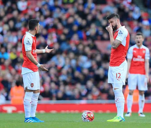 Arsenal s Mesut Ozil and Olivier Giroud look on dejected after Crystal Palace s opening goal during the Premier League match at the Emirates Stadium. Photo credit should read: David Klein Sportimage EDITORIAL USE ONLY. No use with unauthorised audio, video, data, fixture lists, club league logos or live services. Online in-match use limited to 120 images, no video emulation. No use in betting, games or single club league player publications.