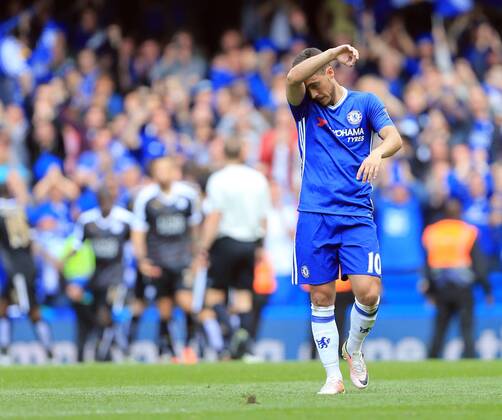 Chelsea s Eden Hazard looks on dejected after Leicester s opening goal during the Barclays Premier League match at Stamford Bridge Stadium. Photo credit should read: David Klein Sportimage EDITORIAL USE ONLY. No use with unauthorised audio, video, data, fixture lists, club league logos or live services. Online in-match use limited to 120 images, no video emulation. No use in betting, games or single club league player publications.