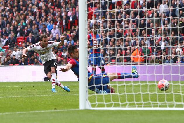 Juan Mata of Manchester United ManU scores his sides first goal during the Emirates FA Cup Final match at Wembley Stadium. Photo credit should read: Philip Oldham Sportimage EDITORIAL USE ONLY. No use with unauthorised audio, video, data, fixture lists, club league logos or live services. Online in-match use limited to 120 images, no video emulation. No use in betting, games or single club league player publications.