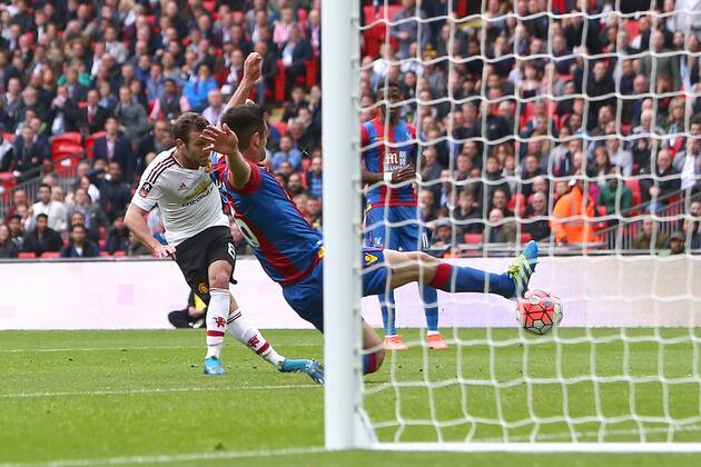 Juan Mata of Manchester United ManU scores his sides first goal during the Emirates FA Cup Final match at Wembley Stadium. Photo credit should read: Philip Oldham Sportimage EDITORIAL USE ONLY. No use with unauthorised audio, video, data, fixture lists, club league logos or live services. Online in-match use limited to 120 images, no video emulation. No use in betting, games or single club league player publications.