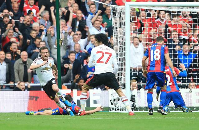 Manchester United ManU s Juan Mata celebrates scoring his sides opening goal during the Emirates FA Cup Final match at Wembley Stadium. Photo credit should read: David Klein Sportimage EDITORIAL USE ONLY. No use with unauthorised audio, video, data, fixture lists, club league logos or live services. Online in-match use limited to 120 images, no video emulation. No use in betting, games or single club league player publications.