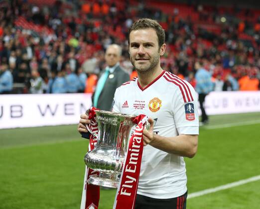 Manchester United ManU s Juan Mata celebrates with the trophy during the Emirates FA Cup Final match at Wembley Stadium. Photo credit should read: David Klein Sportimage EDITORIAL USE ONLY. No use with unauthorised audio, video, data, fixture lists, club league logos or live services. Online in-match use limited to 120 images, no video emulation. No use in betting, games or single club league player publications.