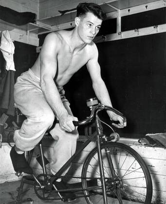 June 10, 2016 - File - GORDIE HOWE, the rough-and-tumble Canadian farm boy whose boundless blend of talent and toughness made him the NHL Eishockey Herren USA s star during a career that lasted into his 50s, has died. The man forever known as Mr. Hockey was 88. Pictured: Feb. 16, 1958 - Detroit, MI, USA - Gordie Howe uses the training bicycle. Gordie Howe 1928 Ð 2016 Mr. HockeyÕ - ZUMAm67_