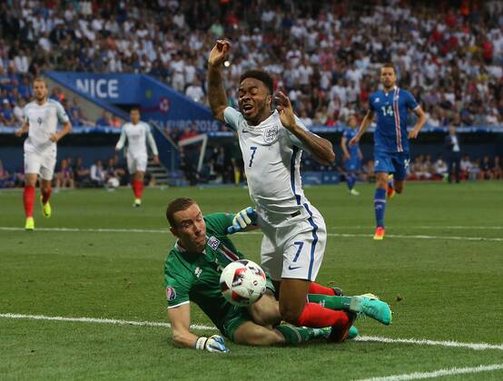 Raheem Sterling of England brought down to earn a penalty by Hannes Halldorsson of Iceland during the Euro 2016 UEFA European Championship EM, Nationalteam, Europameisterschaft match at the Stadium Nice, Nice. Picture date June 27th, 2016 Pic Phil Oldham Sportimage EDITORIAL USE ONLY. No use with unauthorised audio, video, data, fixture lists, club league logos or live services. Online in-match use limited to 120 images, no video emulation. No use in betting, games or single club league player publications.