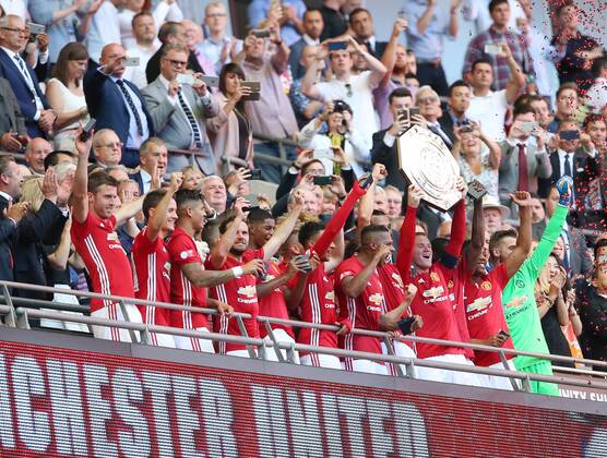 Manchester United ManU s Wayne Rooney celebrates with the trophy during the FA Community Shield match at Wembley Stadium, London. Picture date August 7th, 2016 Pic David Klein Sportimage EDITORIAL USE ONLY. No use with unauthorised audio, video, data, fixture lists, club league logos or live services. Online in-match use limited to 120 images, no video emulation. No use in betting, games or single club league player publications.