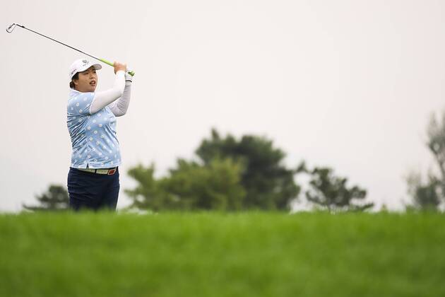 BEIJING, CHINA - SEPTEMBER 26: Feng Shanshan of China swings the club during a training session on Day one of 2016 Reignwood LPGA Golf Damen Classic at Reignwood Pine Valley on September 26, 2016 in Beijing, China. CFP492737096