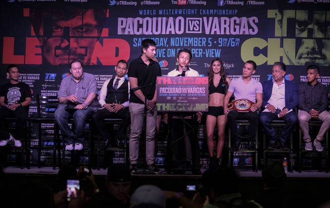 September 27, 2016 - Los Angeles, California, U.S - Chinese boxer Zou Shiming speaks in a press conference PK Pressekonferenz on September 27, 2016 in Los Angeles. Three action-packed World Championship WM Weltmeisterschaft fights (NONITO DONAIRE VS. JESSIE MAGDALENO îSCAR VALDEZ VS. HIROSHIGE OSAWA ZOU SHIMING VS. PRASITAK PAPOEM) will act as co-main events to the MANNY ÒPacmanà PACQUIAO à JESSIE VARGAS World Boxing Organization (WBO) welterweight world title fight, Saturday, November 5, at the Thomas & Mack Center on the campus of the University of Nevada, Las Vegas. Press Conference for World Title Fights - ZUMAc68_