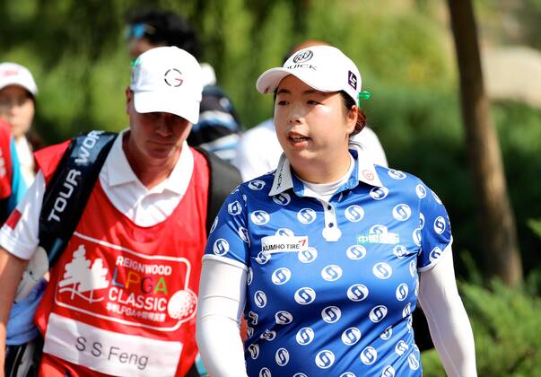 BEIJING, CHINA - SEPTEMBER 29: Feng Shanshan of China in action during the 1st round of the 2016 Reignwood LPGA Golf Damen Classic at Reignwood golf club on September 29, 2016 in Beijing, China. CFP492963931
