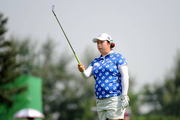 BEIJING, CHINA - SEPTEMBER 29: Feng Shanshan of China in action during the 1st round of the 2016 Reignwood LPGA Golf Damen Classic at Reignwood golf club on September 29, 2016 in Beijing, China. CFP492963951