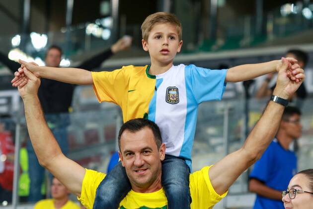 Brasil x Argentina BELO HORIZONTE, MG - 10.11.2016: BRASIL X ARGENTINA - Fan with half a shirt in the middle of Brazil and Argentina for Brazil x Argentina, a match valid for the qualifiers of the World Cup 2018 in Mineirao Stadium in Belo Horizonte, MG. (Photo: Dudu Macedo Fotoarena) x1228496x  DuduxMacedo