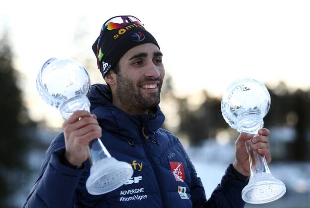 HOLMENKOLLEN, NORWAY - MARCH 17, 2017: Martin Fourcade of France is awarded a small Crystal Globe trophy in the 2016 2017 Season total for the men s 10km sprint event and a small Crystal Globe trophy in the 2016 2017 Season total for individual races, at 2016 2017 IBU World Cup Biathlon 9 in Holmenkollen, Oslo. Andrei Anosov Russian Biathlon Union TASS  TS044A1B