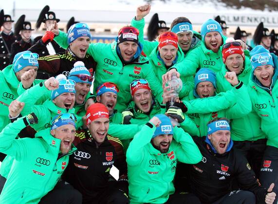 HOLMENKOLLEN, NORWAY - MARCH 17, 2017: German biathletes pose for a group photograph with their trophies after the men s 10km sprint event at 2016 2017 IBU World Cup Biathlon 9 in Holmenkollen, Oslo. Andrei Anosov Russian Biathlon Union TASS  TS044B3B