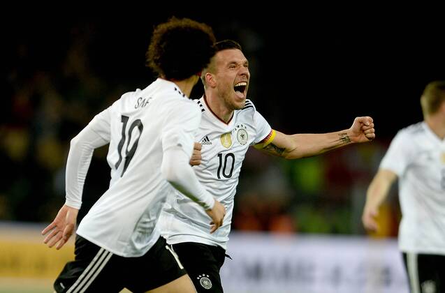 22.03.2017, xfux, Fussball Freundschaftsspiel, Deutschland - England, emspor, v.l. Lukas Podolski (Deutsche Fussball Nationalmannschaft DFB) Torjubel, Goal celebration, celebrate the goal zum 1:0 Dortmund