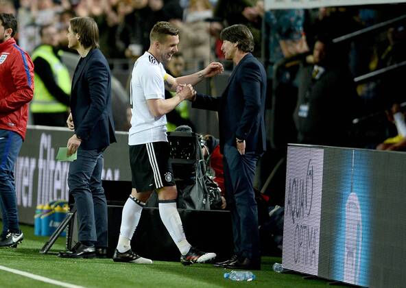 22.03.2017, xfux, Fussball Freundschaftsspiel, Deutschland - England, emspor, v.l. Lukas Podolski (Deutsche Fussball Nationalmannschaft DFB), Trainer Joachim JOGI Loew (Deutsche Fussball Nationalmannschaft DFB) jubelnd bejubelt jubelt jubeln Dortmund