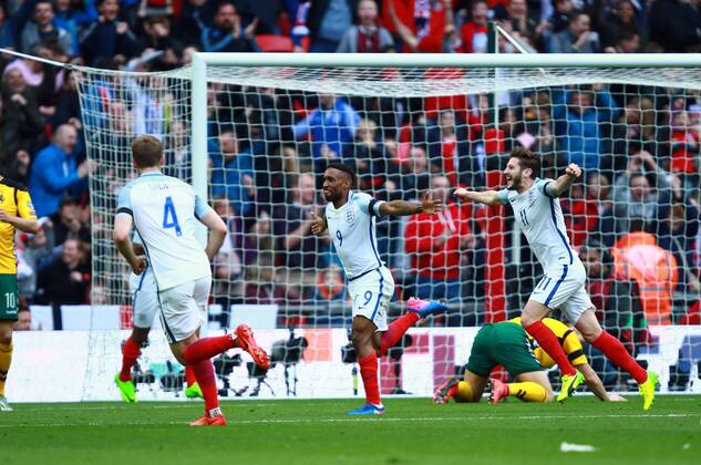 Jermain Defoe (E) celebrates scoring the first England goal (1-0), with Adam Lallana (E) behind him, during the England v Lithuania World Cup Qualifier played at Wembley Stadium, on March 26, 2017.