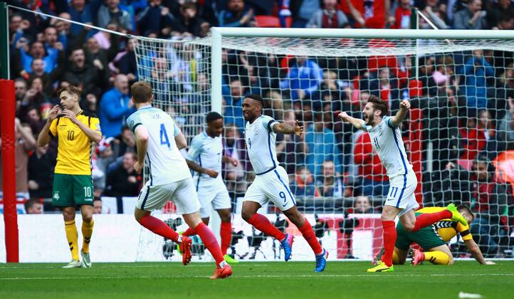 Jermain Defoe (E) celebrates scoring the first England goal (1-0), with Adam Lallana (E) behind him, during the England v Lithuania World Cup Qualifier played at Wembley Stadium, on March 26, 2017.