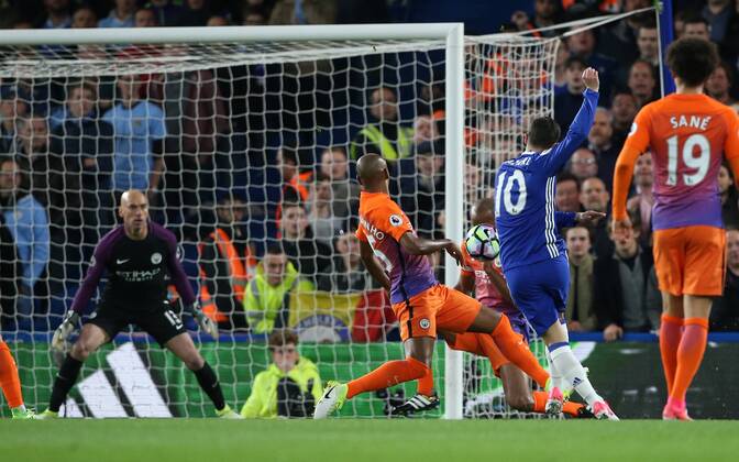 Chelsea s Eden Hazard scoring his sides opening goal during the Premier League match at the Stamford Bridge Stadium, London. Picture date: April 5th, 2017. Pic credit should read: David Klein Sportimage EDITORIAL USE ONLY. No use with unauthorised audio, video, data, fixture lists, club league logos or live services. Online in-match use limited to 120 images, no video emulation. No use in betting, games or single club league player publications.