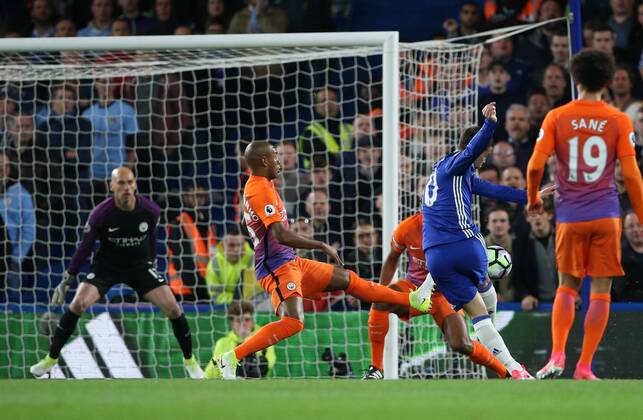 Chelsea s Eden Hazard scoring his sides opening goal during the Premier League match at the Stamford Bridge Stadium, London. Picture date: April 5th, 2017. Pic credit should read: David Klein Sportimage EDITORIAL USE ONLY. No use with unauthorised audio, video, data, fixture lists, club league logos or live services. Online in-match use limited to 120 images, no video emulation. No use in betting, games or single club league player publications.