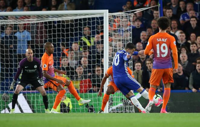 Chelsea s Eden Hazard scoring his sides opening goal during the Premier League match at the Stamford Bridge Stadium, London. Picture date: April 5th, 2017. Pic credit should read: David Klein Sportimage EDITORIAL USE ONLY. No use with unauthorised audio, video, data, fixture lists, club league logos or live services. Online in-match use limited to 120 images, no video emulation. No use in betting, games or single club league player publications.