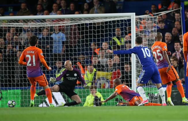 Chelsea s Eden Hazard scoring his sides opening goal during the Premier League match at the Stamford Bridge Stadium, London. Picture date: April 5th, 2017. Pic credit should read: David Klein Sportimage EDITORIAL USE ONLY. No use with unauthorised audio, video, data, fixture lists, club league logos or live services. Online in-match use limited to 120 images, no video emulation. No use in betting, games or single club league player publications.