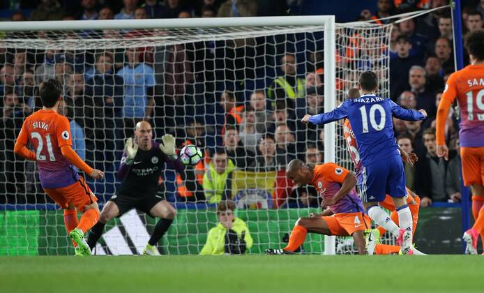 Chelsea s Eden Hazard scoring his sides opening goal during the Premier League match at the Stamford Bridge Stadium, London. Picture date: April 5th, 2017. Pic credit should read: David Klein Sportimage EDITORIAL USE ONLY. No use with unauthorised audio, video, data, fixture lists, club league logos or live services. Online in-match use limited to 120 images, no video emulation. No use in betting, games or single club league player publications.