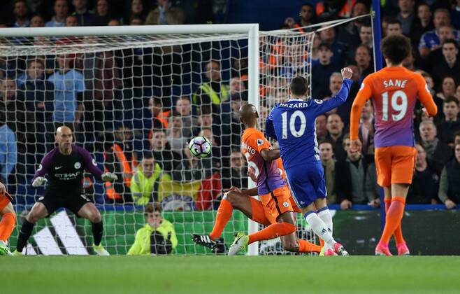 Chelsea s Eden Hazard scoring his sides opening goal during the Premier League match at the Stamford Bridge Stadium, London. Picture date: April 5th, 2017. Pic credit should read: David Klein Sportimage EDITORIAL USE ONLY. No use with unauthorised audio, video, data, fixture lists, club league logos or live services. Online in-match use limited to 120 images, no video emulation. No use in betting, games or single club league player publications.