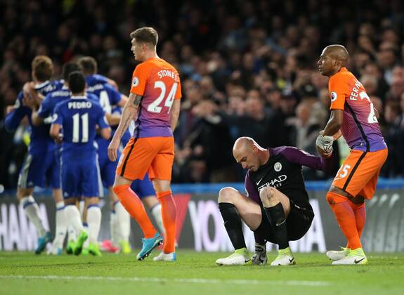 Chelsea s Eden Hazard celebrates scoring his sides second goal as Manchester City s Willy Caballero looks on dejected during the Premier League match at the Stamford Bridge Stadium, London. Picture date: April 5th, 2017. Pic credit should read: David Klein Sportimage EDITORIAL USE ONLY. No use with unauthorised audio, video, data, fixture lists, club league logos or live services. Online in-match use limited to 120 images, no video emulation. No use in betting, games or single club league player publications.