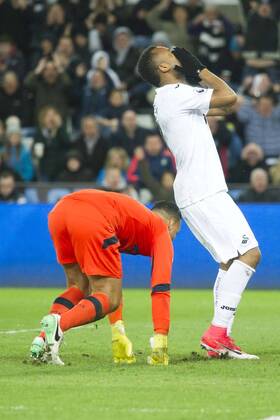 Football - 2016 2017 Premier League - Swansea City vs. Tottenham Hotspur Jordan Ayew of Swansea shoots wide of Michel Vorm of Tottenham Hotspurs , at The Liberty Stadium. COLORSPORT WINSTON BYNORTH