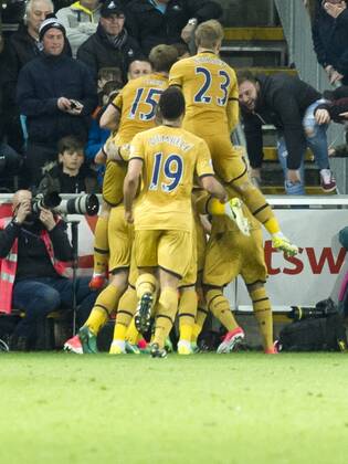 Football - 2016 2017 Premier League - Swansea City vs. Tottenham Hotspur A Spurs fan jump on to the pitch as Heung-Min Son of Tottenham Hotspurs celebrates scoring his team s second goal in front of spurs fans , at The Liberty Stadium. COLORSPORT WINSTON BYNORTH