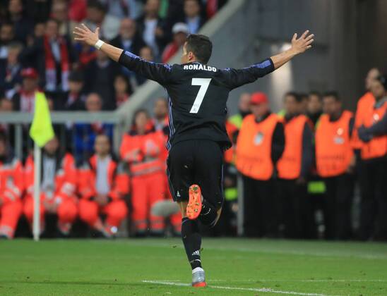 Real Madrid s Cristiano Ronaldo celebrates scoring during the UEFA Champions League quarter-final first leg match between Bayern Munich and Real Madrid in Munich, Germany, on April 12, 2017. Bayern Munich lost 1-2. ) (SP)GERMANY-MUNICH-SOCCER-UEFA-BAYERN MUNICH VS REAL MADRID PhilippexRuiz