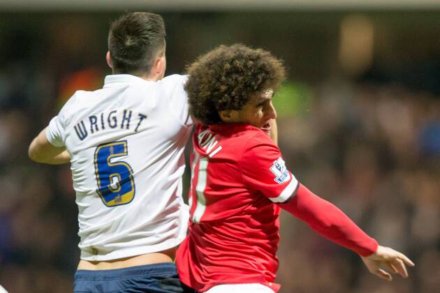 Manchester United ManU s Marouane Fellaini is elbowed by Preston s Bailey Wright during the The FA Cup match between Preston North End and Manchester United at Deepdale, Preston, England on 16 February 2015. Copyright: xJamesxWilliamsonx 02360013