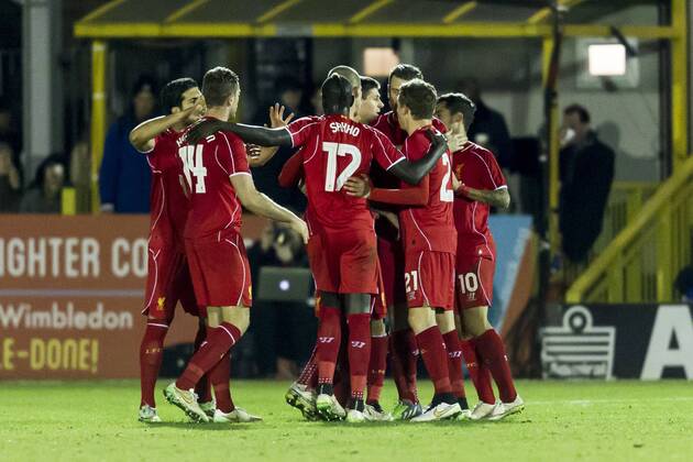 Steven Gerrard of Liverpool celebrates scoring his second goal with team mates during the The FA Cup match between AFC Wimbledon and Liverpool at the Cherry Red Records Stadium, Kingston, England on 5 January 2015. Copyright: xGarethxxBrownx 01320023