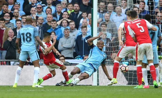 Arsenal s Alexis Sanchez scoring his sides second goal during the FA Cup Semi Final match at Wembley Stadium, London. Picture date: April 23rd, 2017. Pic credit should read: David Klein Sportimage EDITORIAL USE ONLY. No use with unauthorised audio, video, data, fixture lists, club league logos or live services. Online in-match use limited to 120 images, no video emulation. No use in betting, games or single club league player publications.