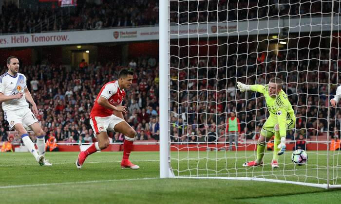 Arsenal s Alexis Sanchez scoring his sides opening goal during the Premier League match at the Emirates Stadium, London. Picture date: May 16th, 2017. Pic credit should read: David Klein Sportimage EDITORIAL USE ONLY. No use with unauthorised audio, video, data, fixture lists, club league logos or live services. Online in-match use limited to 120 images, no video emulation. No use in betting, games or single club league player publications.