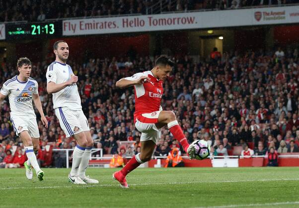 Arsenal s Alexis Sanchez scoring his sides opening goal during the Premier League match at the Emirates Stadium, London. Picture date: May 16th, 2017. Pic credit should read: David Klein Sportimage EDITORIAL USE ONLY. No use with unauthorised audio, video, data, fixture lists, club league logos or live services. Online in-match use limited to 120 images, no video emulation. No use in betting, games or single club league player publications.