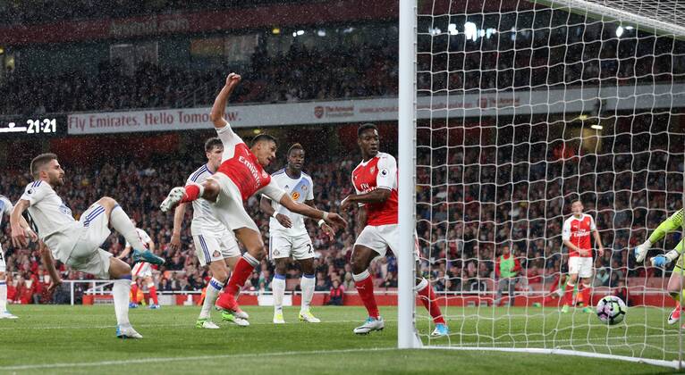 Arsenal s Alexis Sanchez scoring his sides second goal during the Premier League match at the Emirates Stadium, London. Picture date: May 16th, 2017. Pic credit should read: David Klein Sportimage EDITORIAL USE ONLY. No use with unauthorised audio, video, data, fixture lists, club league logos or live services. Online in-match use limited to 120 images, no video emulation. No use in betting, games or single club league player publications.
