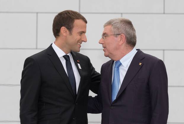 (170711) -- LAUSANNE, July 11,2017 -- French President Emmanuel Macron (L) communicates with International Olympic Committee (IOC) President Thomas Bach at the Olympic Museum in Lausanne, Switzerland, July 10, 2017. Members of IOC will hold a session for presentations by the campaign teams for Los Angeles and Paris on July 11th and 12th. ) (SP)SWITZERLAND-LAUSANNE Olympic Games Olympische Spiele Olympia OS 2024 BID XuxJinquan 