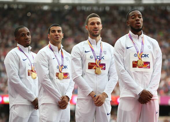 August 13th 2017, London Stadium, East London, England; IAAF World Championships, Day 10; Chijindu Ujah of Great Britain, Adam Gemili of Great Britain, Daniel Talbot of Great Britain and Nethaneel Mitchell-Blake of Great Britain singing the national anthem while wearing Gold Medals for 4x100 metres relay men during the medal ceremony xJohnxPatrickxFletcherx  ActionPlus11916148