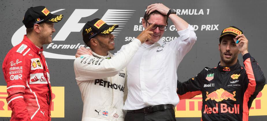 Ferrari s German driver Sebastian Vettel, Mercedes British driver Lewis Hamilton, Mercedes AMG Managing Director Andy Cowell and Red Bull s Australian driver Daniel Ricciardo celebrate on the podium after the Spa-Francorchamps Formula One Grand Prix of Belgium race, in Spa-Francorchamps, Sunday 27 August 2017. BENOITxDOPPAGNE x05153374x