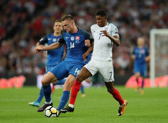 England s Marcus Rashford tussles with Slovakia s Milan Skriniar during the World Cup Qualifier match at Wembley Stadium, London. Picture date 4th September 2017. Picture credit should read: David Klein Sportimage EDITORIAL USE ONLY. No use with unauthorised audio, video, data, fixture lists, club league logos or live services. Online in-match use limited to 120 images, no video emulation. No use in betting, games or single club league player publications.