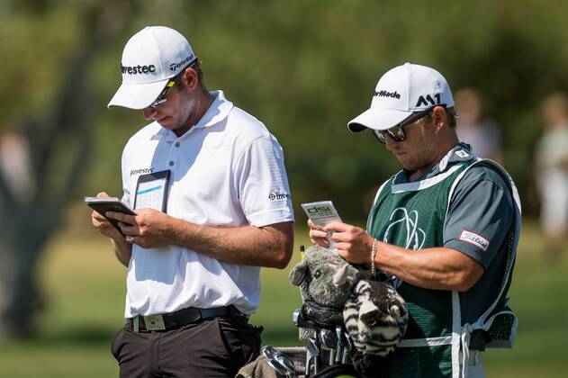 Dean Burmester and his caddy check the yardage to the pin during day 4 of the European Tour - Portugal Masters 2017 at Dom Pedro Victoria Golf Course, Vilamoura, Portugal on 24 September 2017. Copyright: xMatthewxBuchanx 16770224