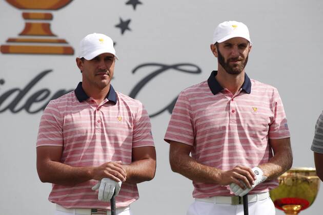 JERSEY CITY, NJ - SEPTEMBER 29: USA golfers Brooks Koepka and Dustin Johnson wait to tee off on the first hole during the second round of the Presidents Cup at Liberty National Golf Club on September 29, 2017 in Jersey City, New Jersey. (Photo by Brian Spurlock Icon Sportswire) GOLF: SEP 29 PGA Golf Herren - The Presidents Cup - Second Round Icon17092998 EDITORIAL USE ONLY