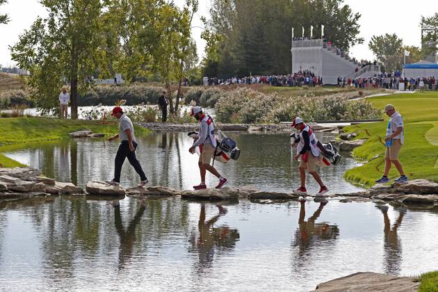 JERSEY CITY, NJ - SEPTEMBER 30: USA golfers Patrick Reed walks across a stream by stepping on rocks as he walks to the 13th tee during the third round of the Presidents Cup at Liberty National Golf Club on September 30, 2017 in Jersey City, New Jersey. (Photo by Brian Spurlock Icon Sportswire) GOLF: SEP 30 PGA Golf Herren - The Presidents Cup - Third Round Icon170930366 EDITORIAL USE ONLY