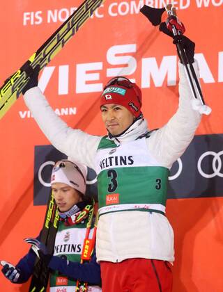 Skiing: Nordic combined World Cup season opener Japan s Akito Watabe acknowledges the crowd on the podium in Ruka, Finland, on Nov. 24, 2017, after finishing third in the Nordic combined s World Cup season opener. 