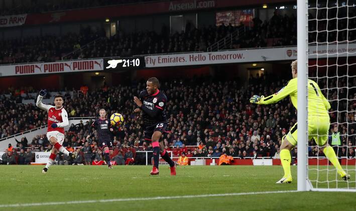 Arsenal s Alexis Sanchez scoring his sides third goal during the premier league match at the Emirates Stadium, London. Picture date 29th November 2017. Picture credit should read: David Klein Sportimage EDITORIAL USE ONLY. No use with unauthorised audio, video, data, fixture lists, club league logos or live services. Online in-match use limited to 120 images, no video emulation. No use in betting, games or single club league player publications.