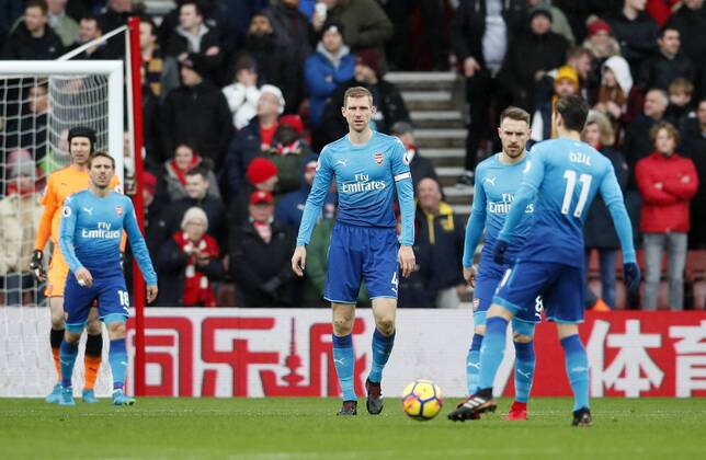 Arsenal s Per Mertesacker looks on dejected after Southampton s opening goal during the premier league match at St Mary s Stadium, Southampton. Picture date 10th December 2017. Picture credit should read: David Klein Sportimage EDITORIAL USE ONLY. No use with unauthorised audio, video, data, fixture lists, club league logos or live services. Online in-match use limited to 120 images, no video emulation. No use in betting, games or single club league player publications.