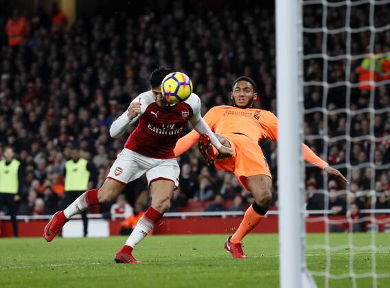 Arsenal s Alexis Sanchez scoring his sides opening goal during the premier league match at the Emirates Stadium, London. Picture date 22nd December 2017. Picture credit should read: David Klein Sportimage EDITORIAL USE ONLY. No use with unauthorised audio, video, data, fixture lists, club league logos or live services. Online in-match use limited to 120 images, no video emulation. No use in betting, games or single club league player publications.